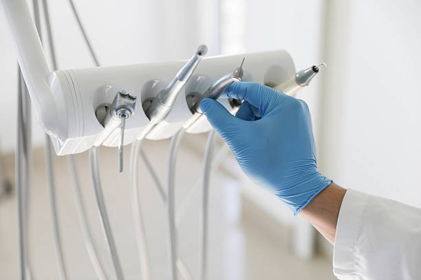Professional Invisalign Clear Aligners technician working in South Monroe, MI